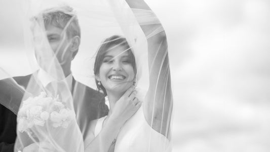 bride posing with her bridal accessories