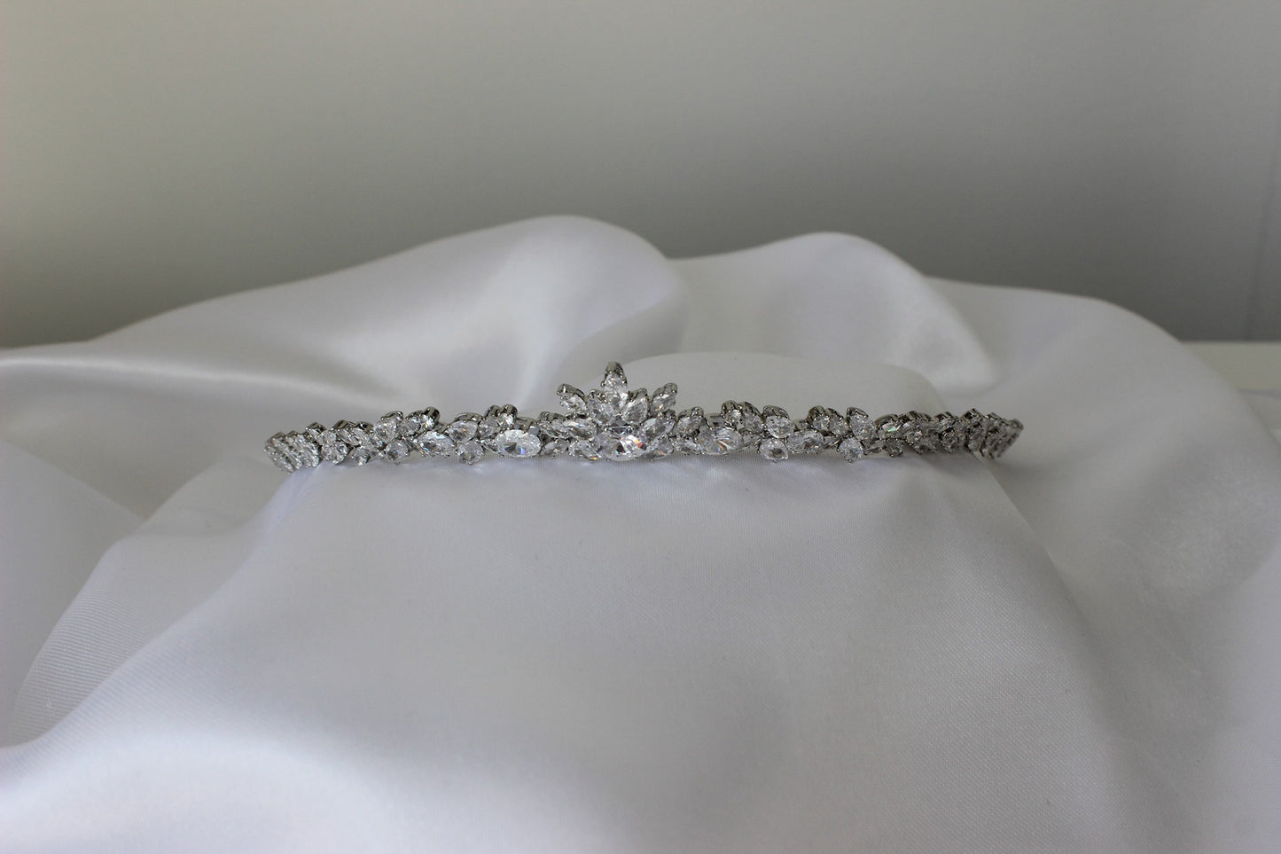 Vivian small silver bridal headpiece on white cloth