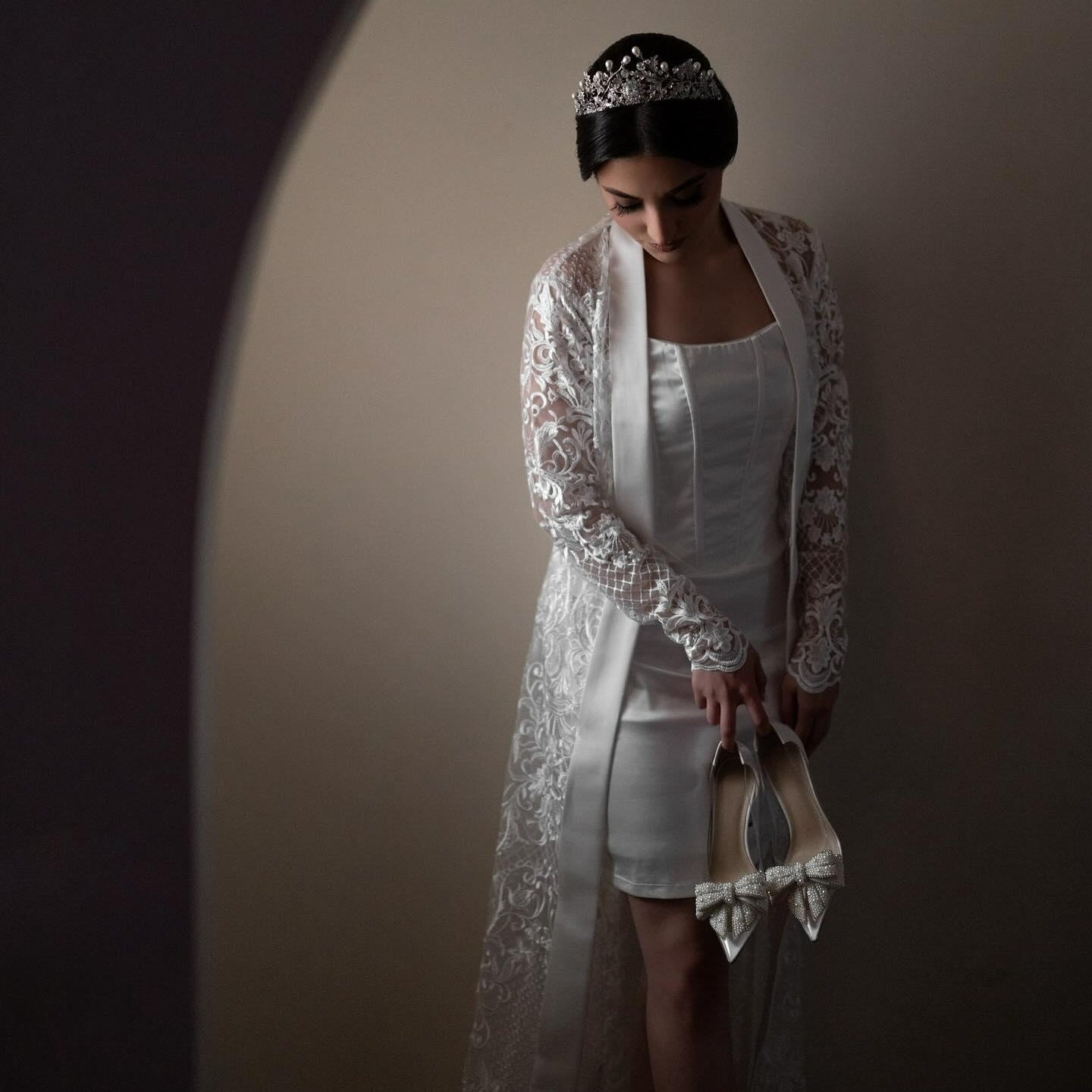 Bride wearing bridal slip and bridal robe