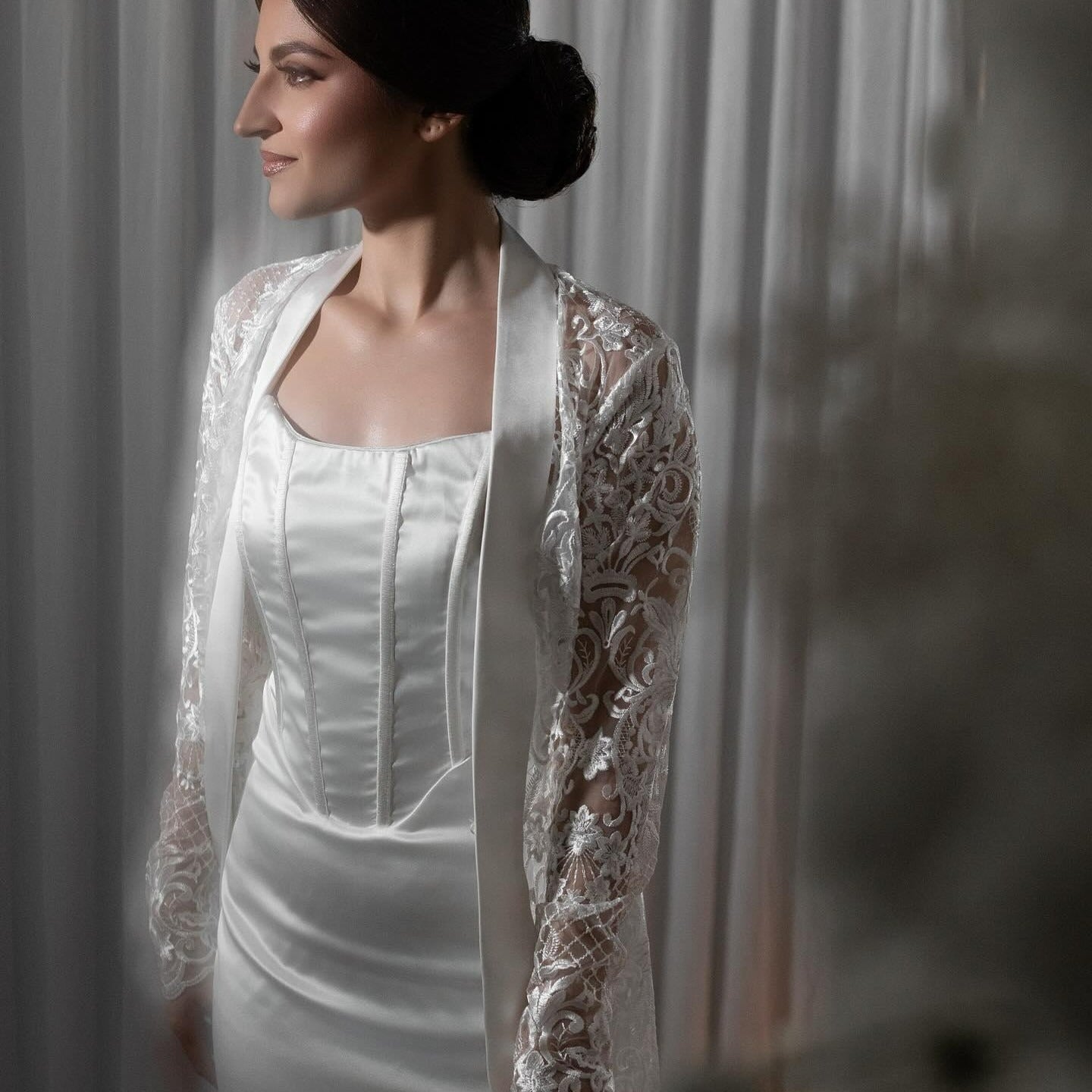 Bride wearing bridal slip and bridal robe