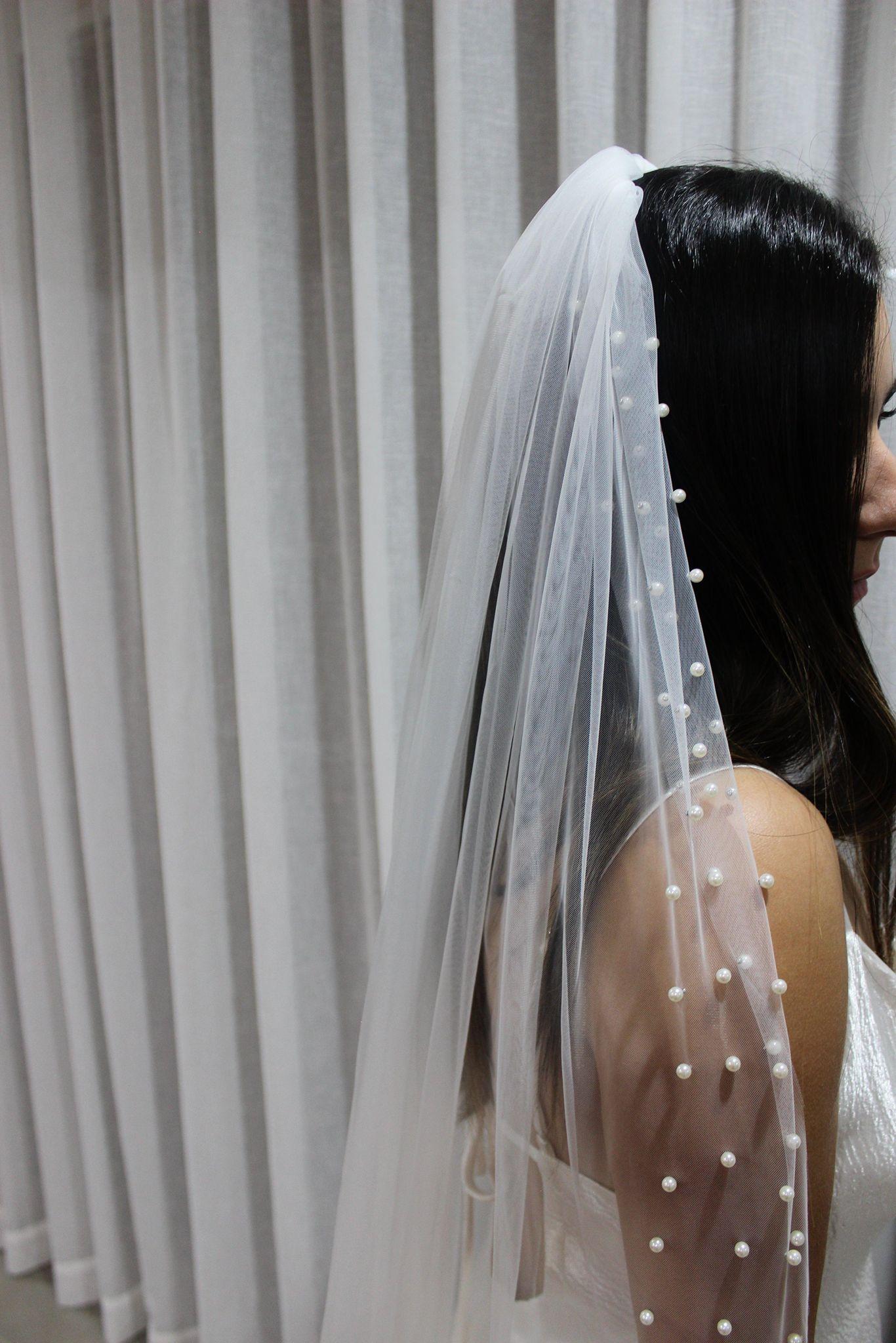 Bride Wearing Pearl Mantilla Veil