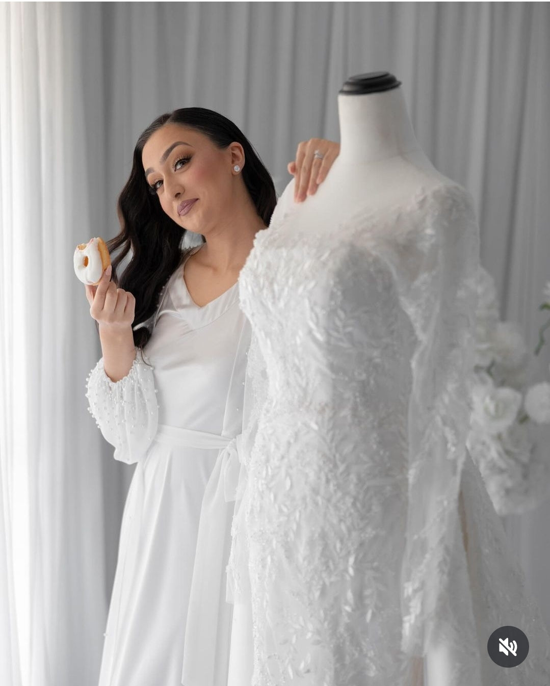 Bride wearing pearl chiffon robe