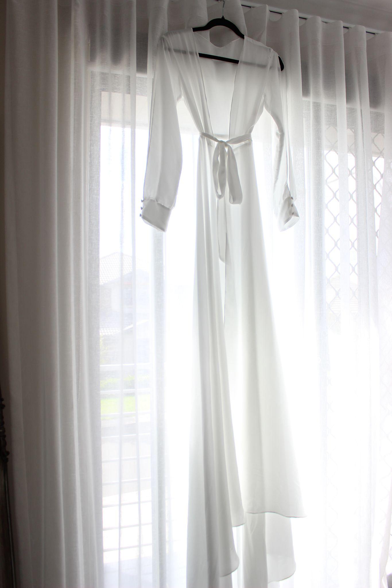 Angel Spliced Sleeve Chiffon robe hanging on a black hanger