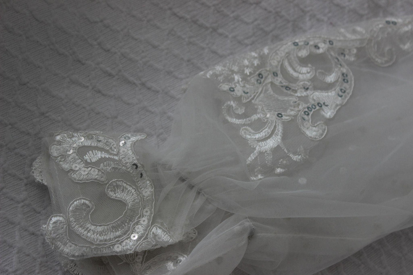 Close up of the wrist detail on the Ariana Lace Robe