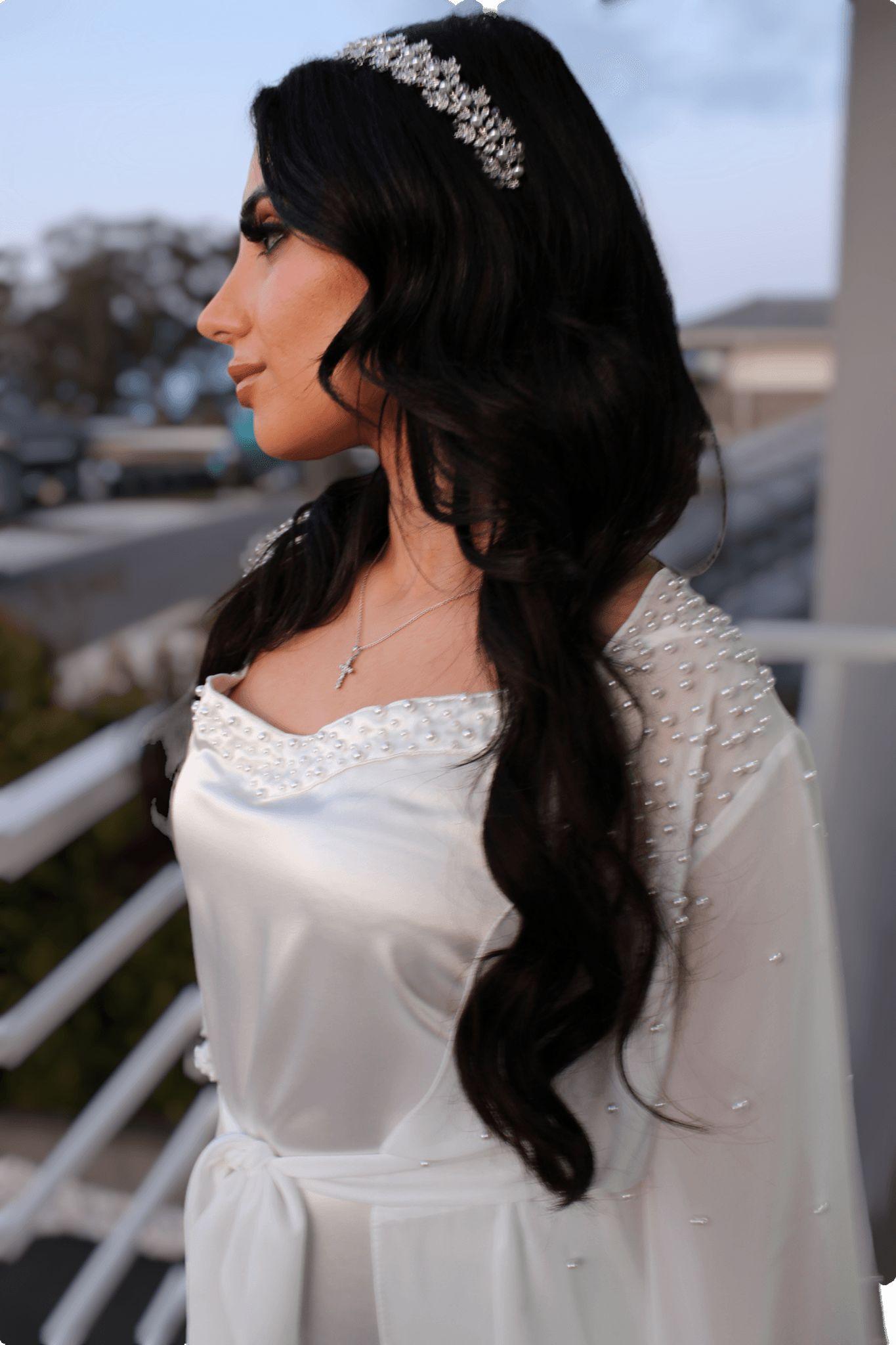 Model wearing pearl bridal robe and bridal slip