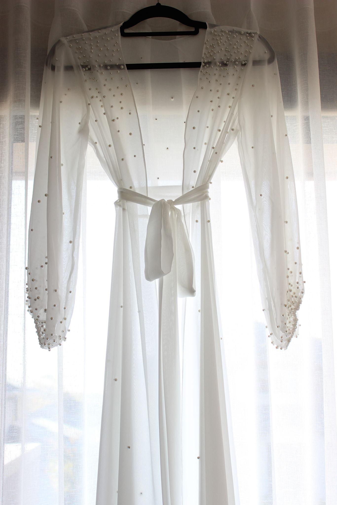 Chiffon Pearl Bridal Robe Hung On Curtain