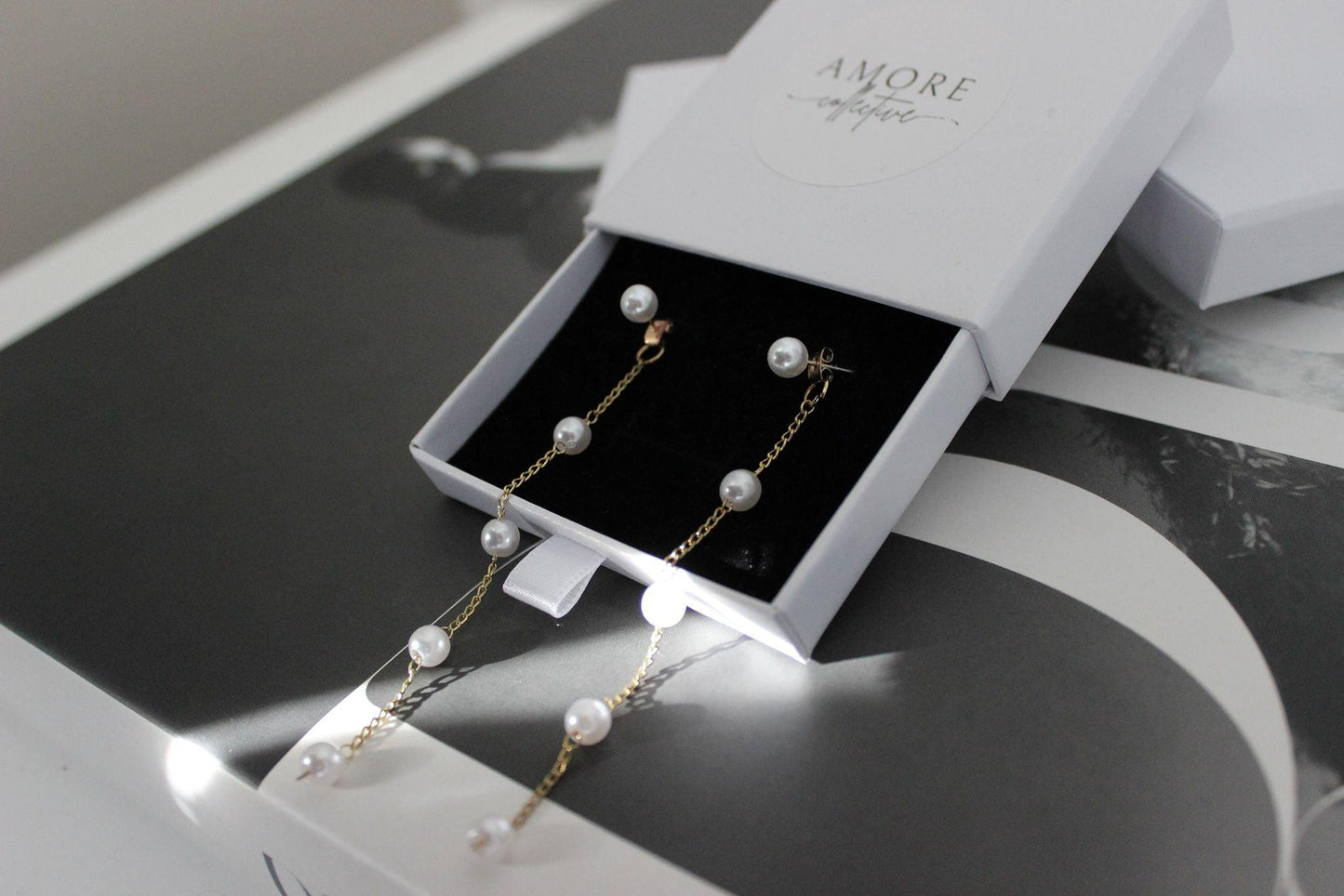 diana pearl gold drop earrings with long pearl drops