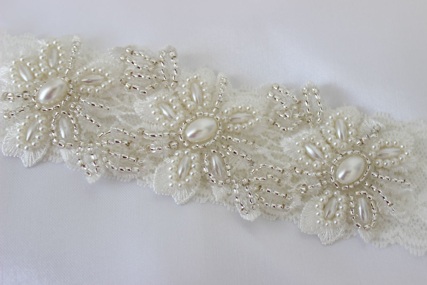 Floral wedding garter with lace