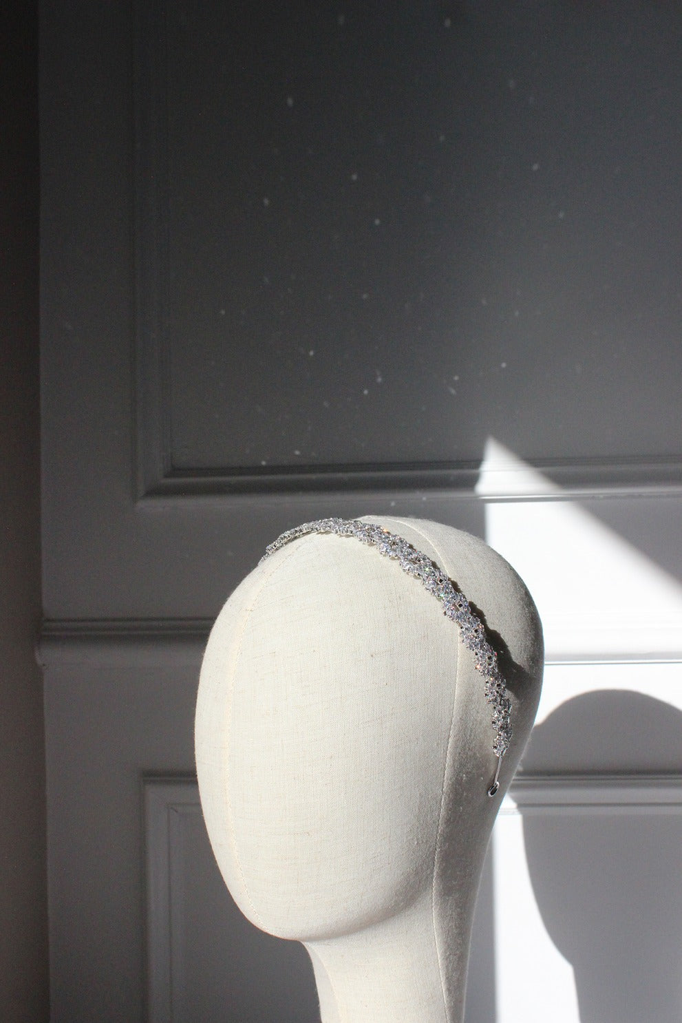 Kaia silver bridal headband on mannequin