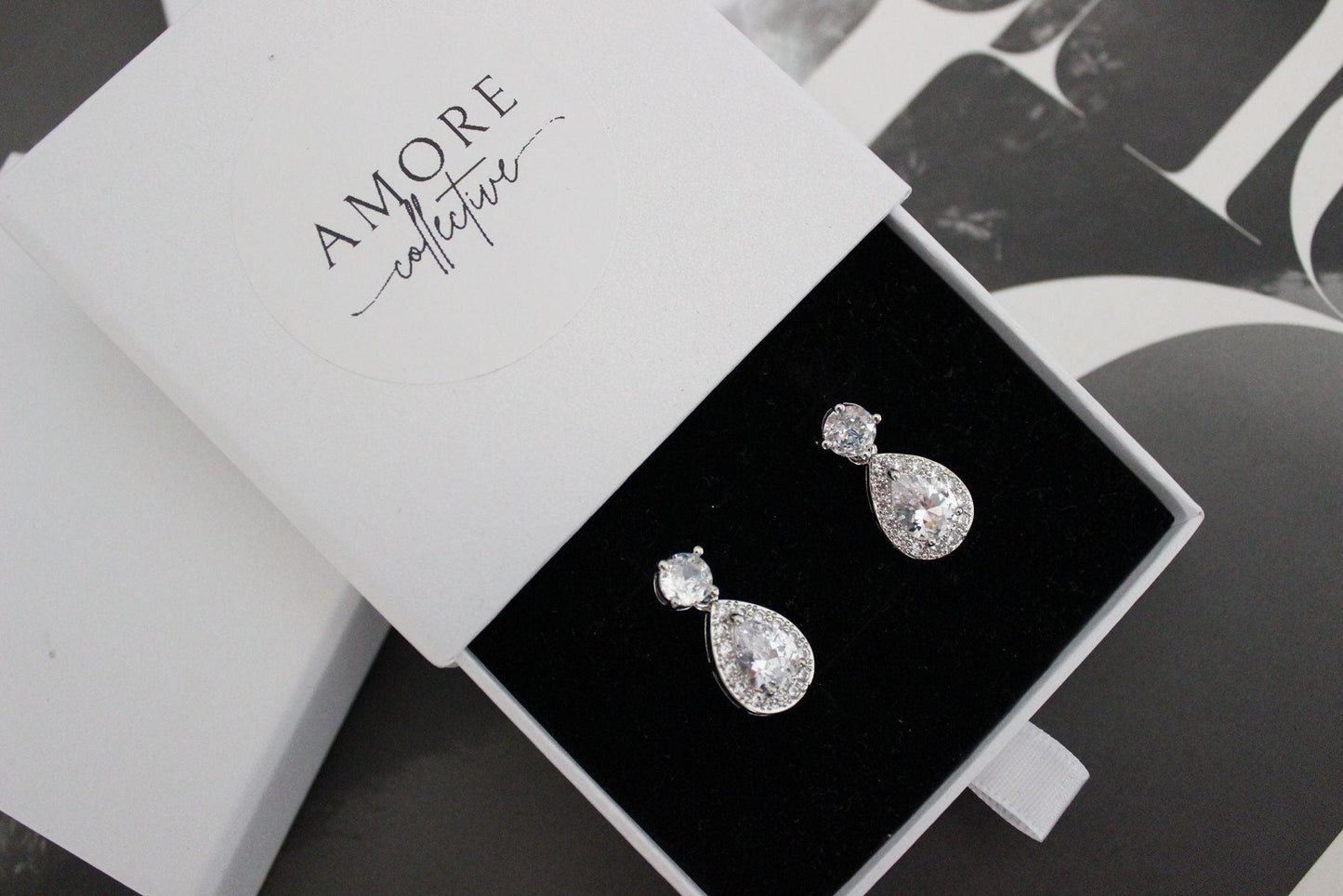 Karmela teardrop cubic zirconia silver drop earrings in jewellery box