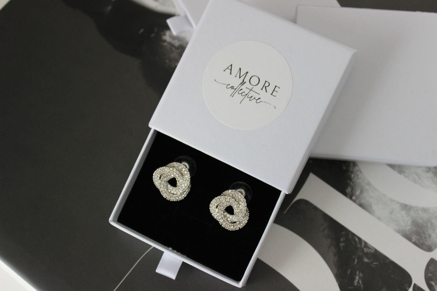 arge bridal swirl silver bridesmaid earrings in jewellery box