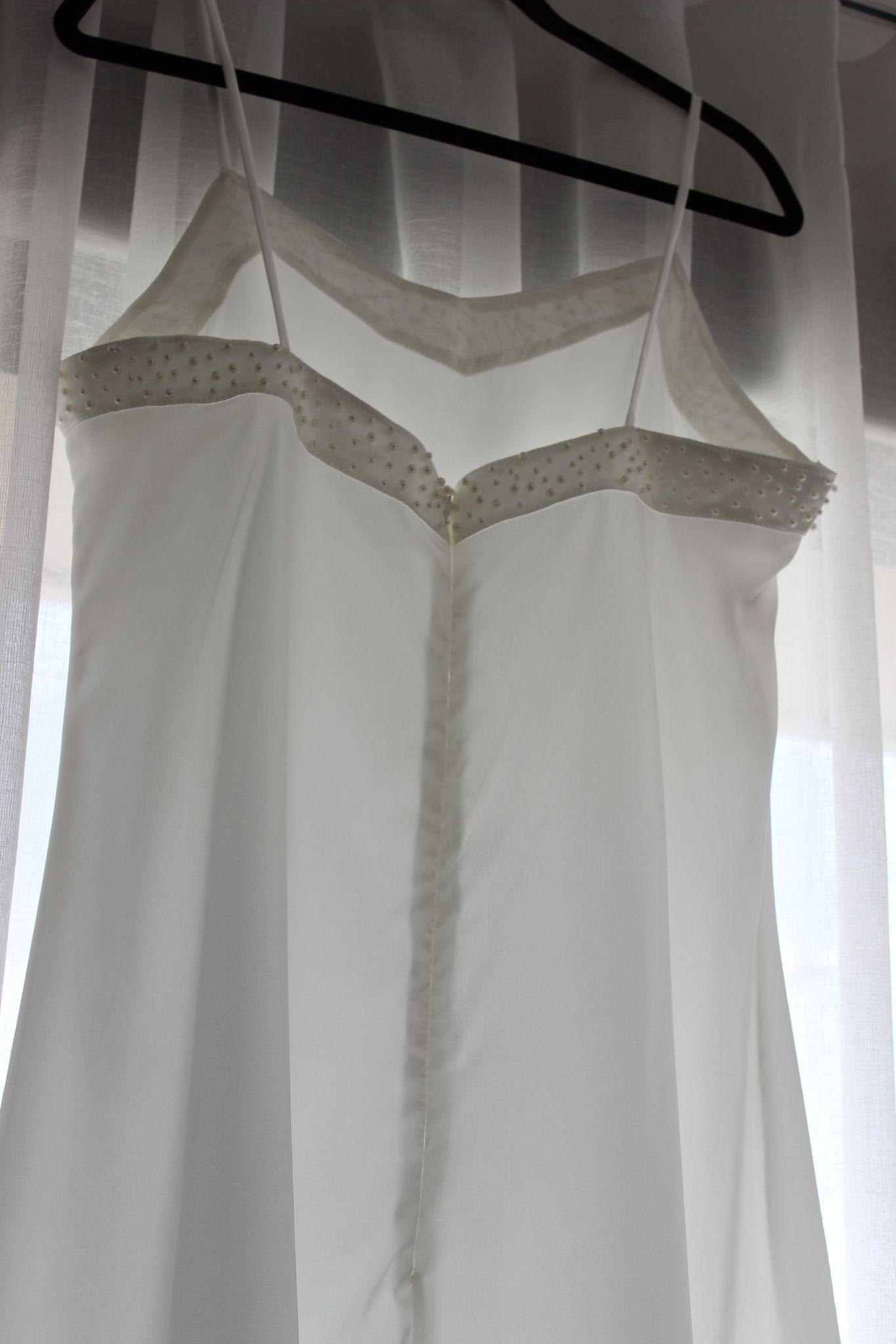 Pearl Bridal Slip on black coat hanger