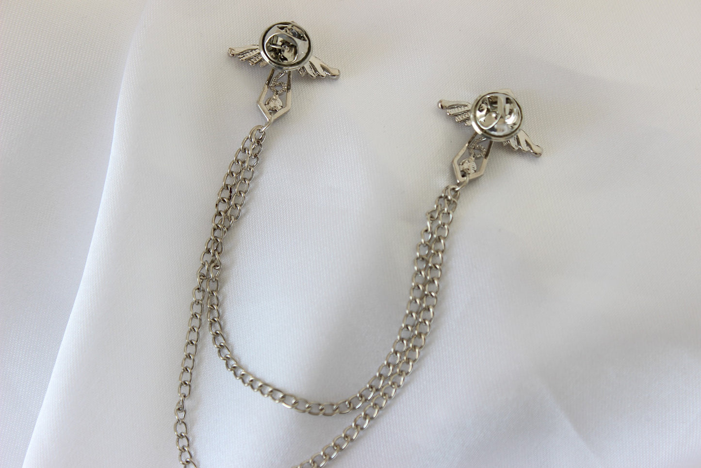 silver angel wings cross brooch