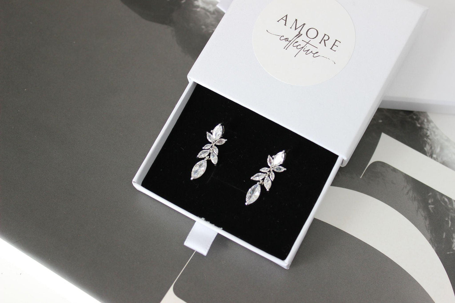 Silver drop bridal earrings with leaf detail