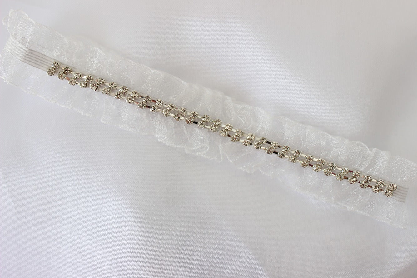 Silver embellished bridal garter with white lace
