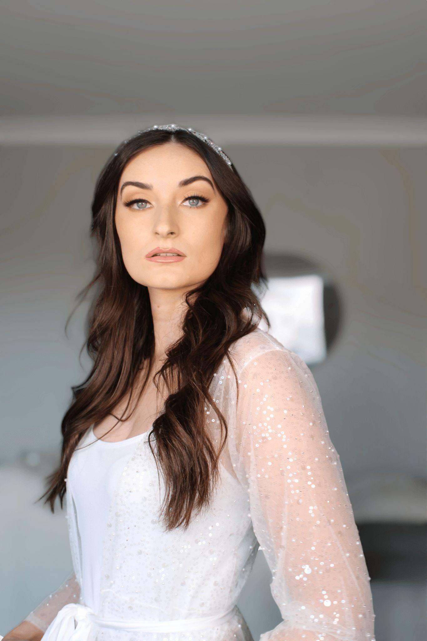 Model wearing the Veronique Sequins Bridal Robe posing gracefully while looking forward