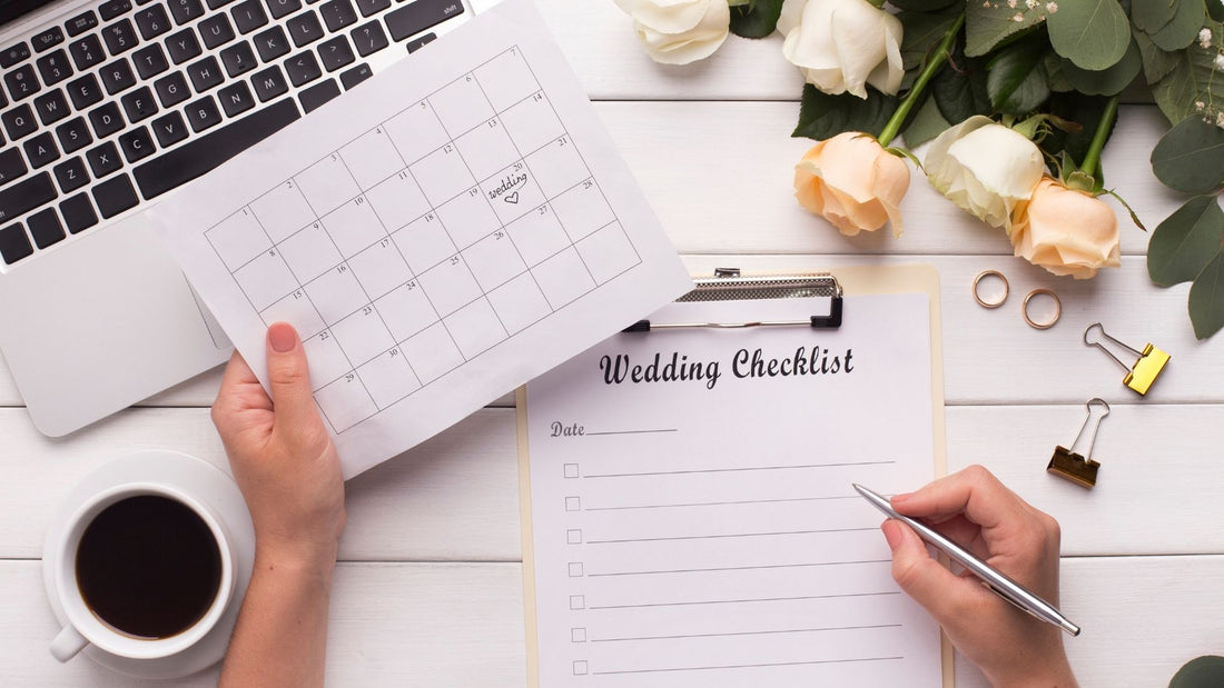 bride preparing wedding checklist at her desk 