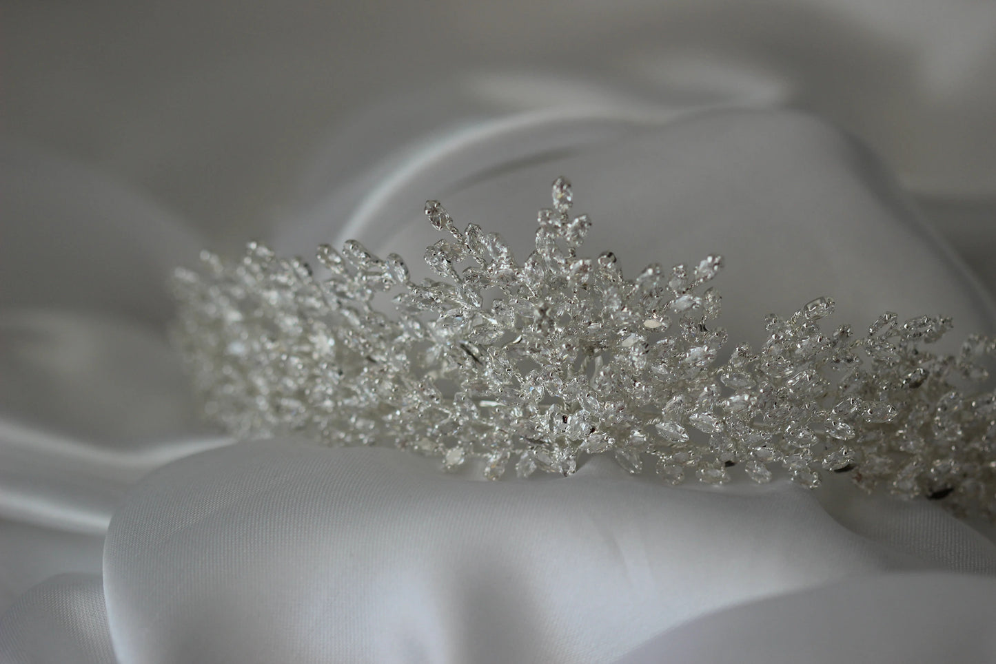 alessandra medium silver bridal crown on white cloth