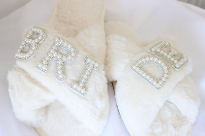 Bridal slippers with "bride" text on them