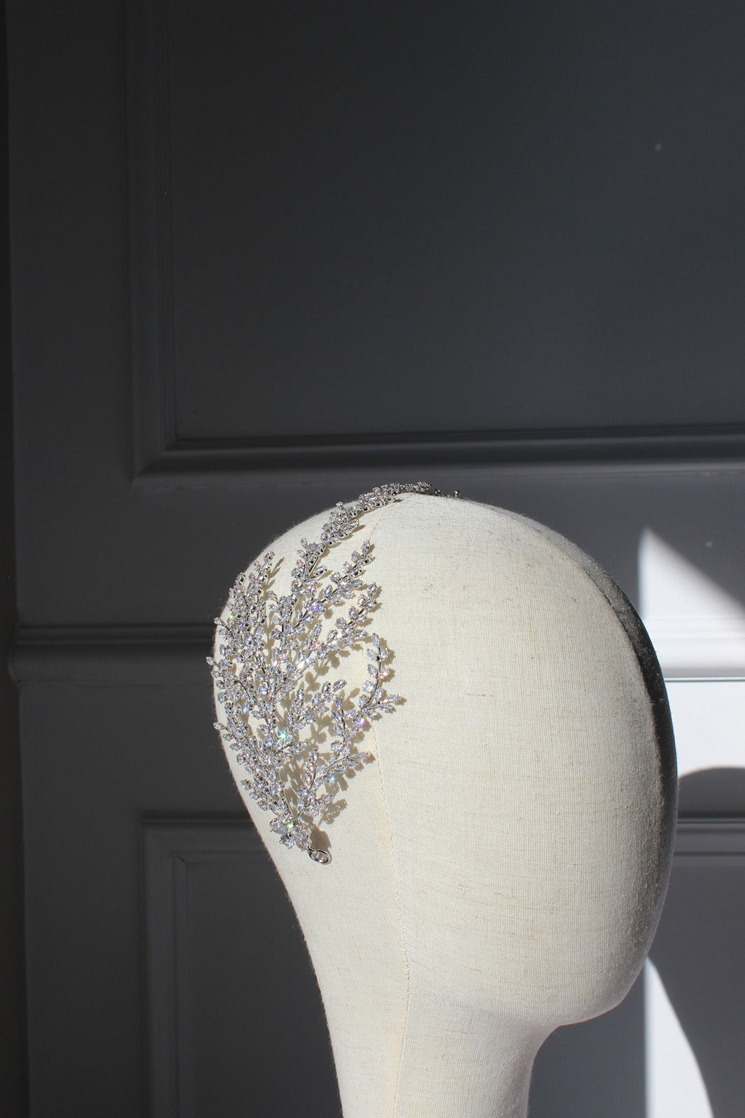 Silver bridal headpiece on mannequin