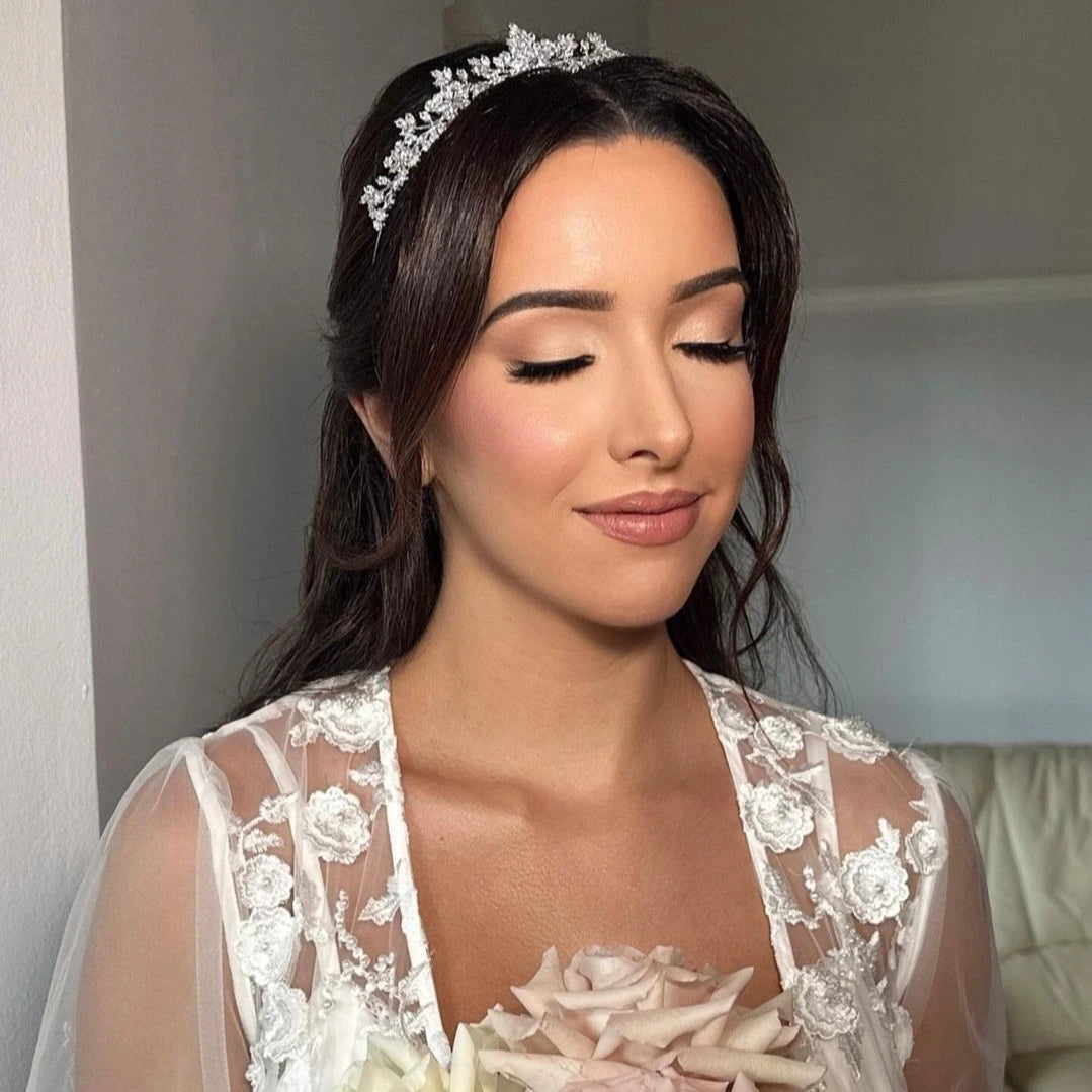Bride wearing silver bridal tiara and bridal robe