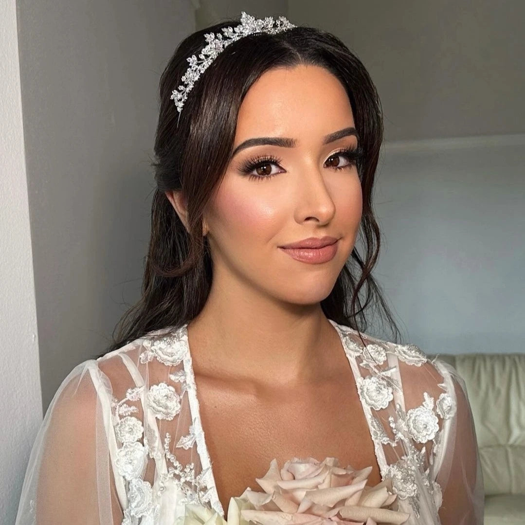 Bride wearing silver bridal tiara and bridal robe