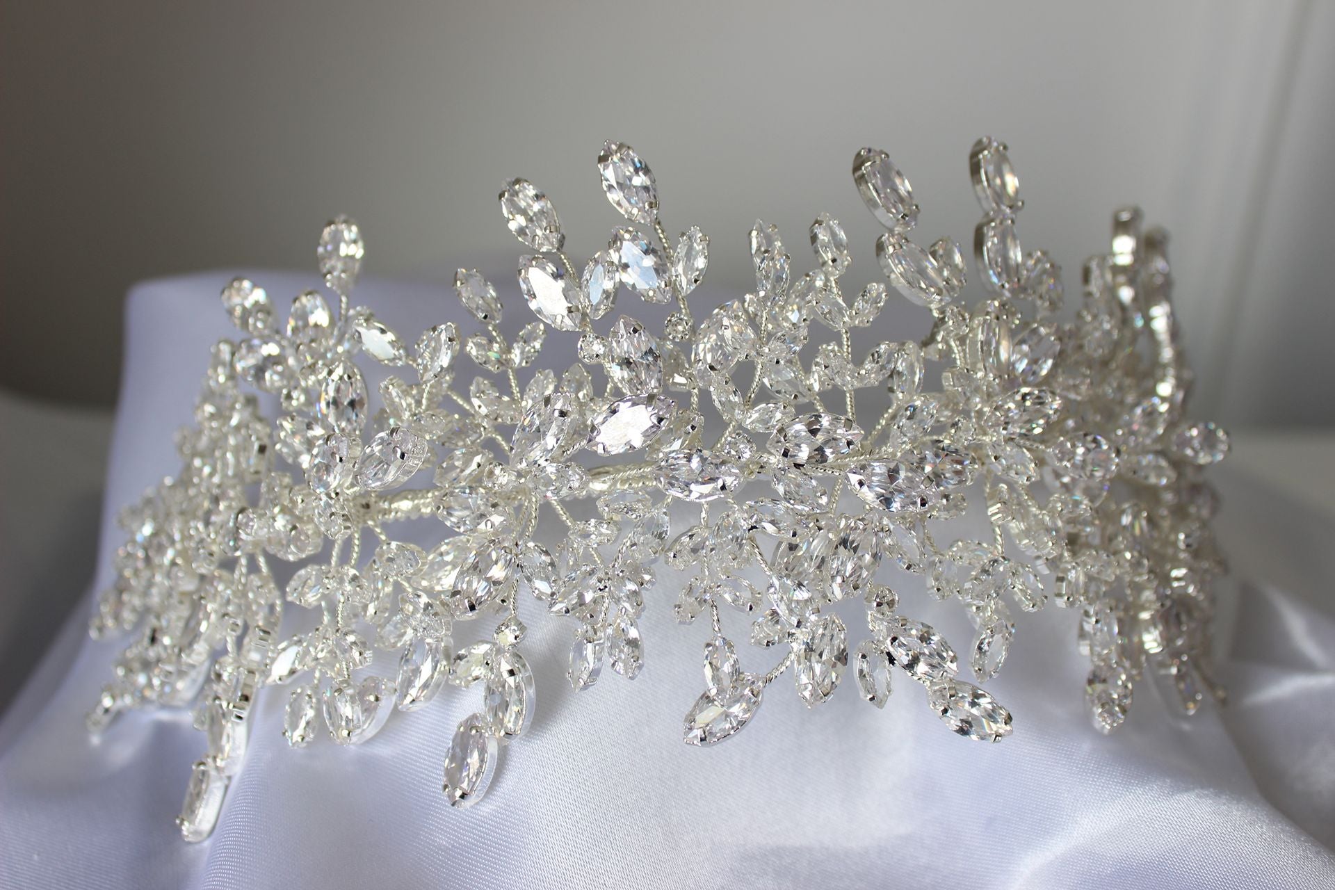 Grace Couture silver wedding headpiece with crystal leaf design