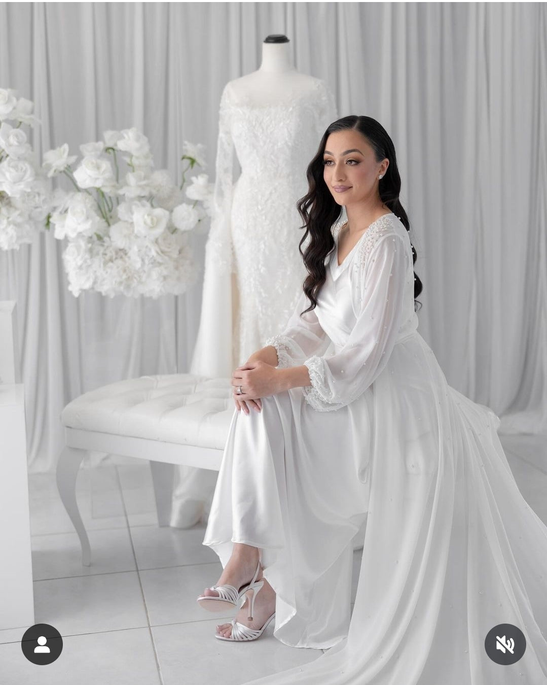 Bride wearing chiffon pearl robe