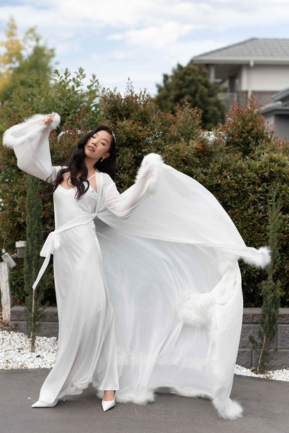 Sydney fur robe on model outside
