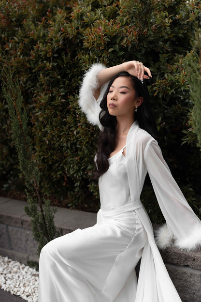 Sydney fur robe on model outside