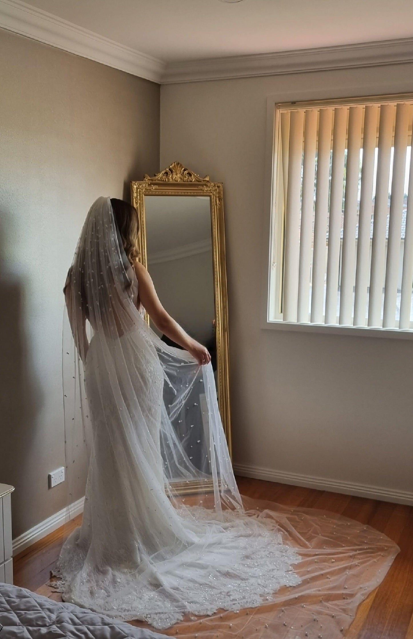 Bride wearing Scattered Pearl Veil 1 Tier