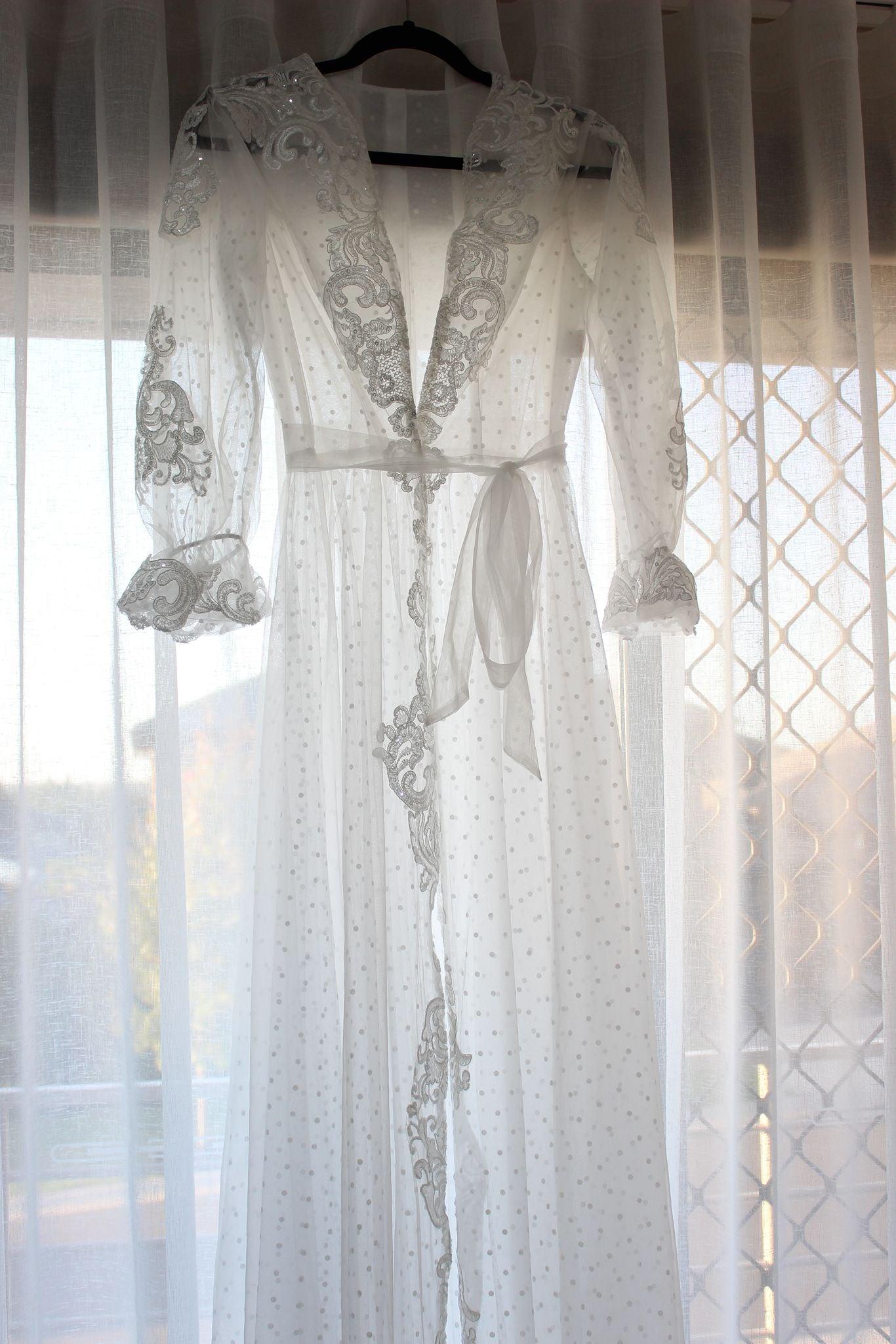 Full length view of the Ariana Lace Robe hanging