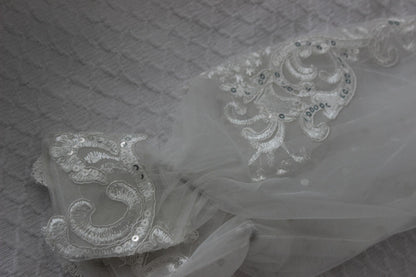 Close up of the wrist detail on the Ariana Lace Robe