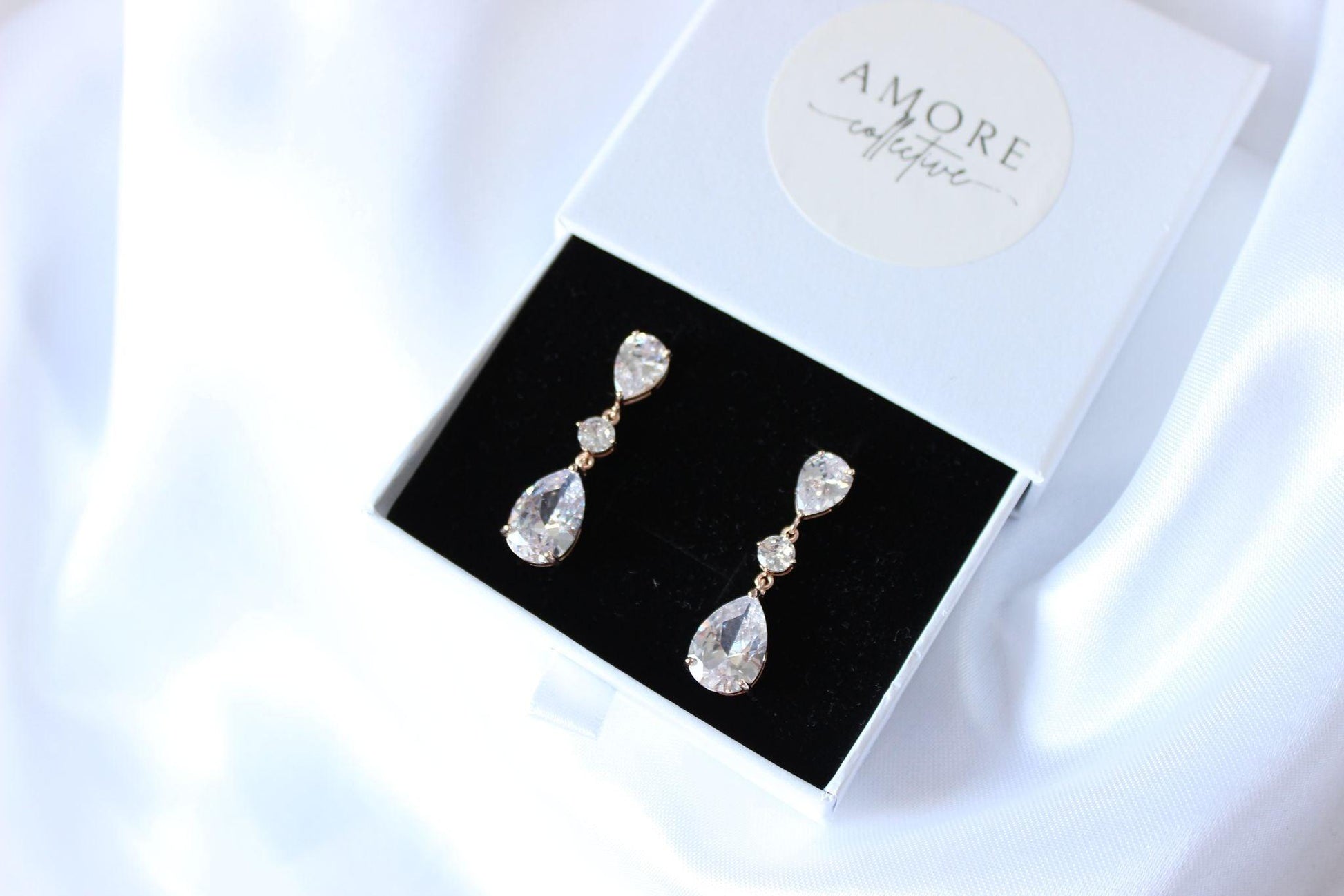 Belle rose gold drop earrings