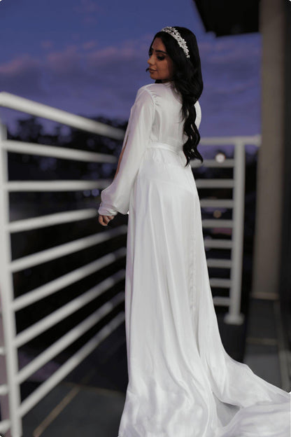 Bride looking over balcony in Angel Spliced Sleeve Chiffon Robe