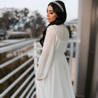 Model wearing pearl bridal robe and bridal slip