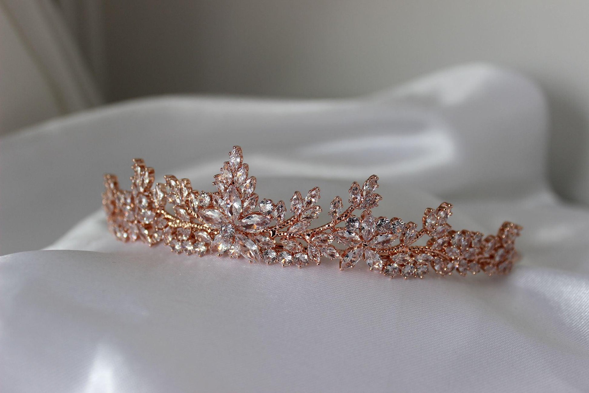 rose gold dana wedding tiara displayed on white fabric