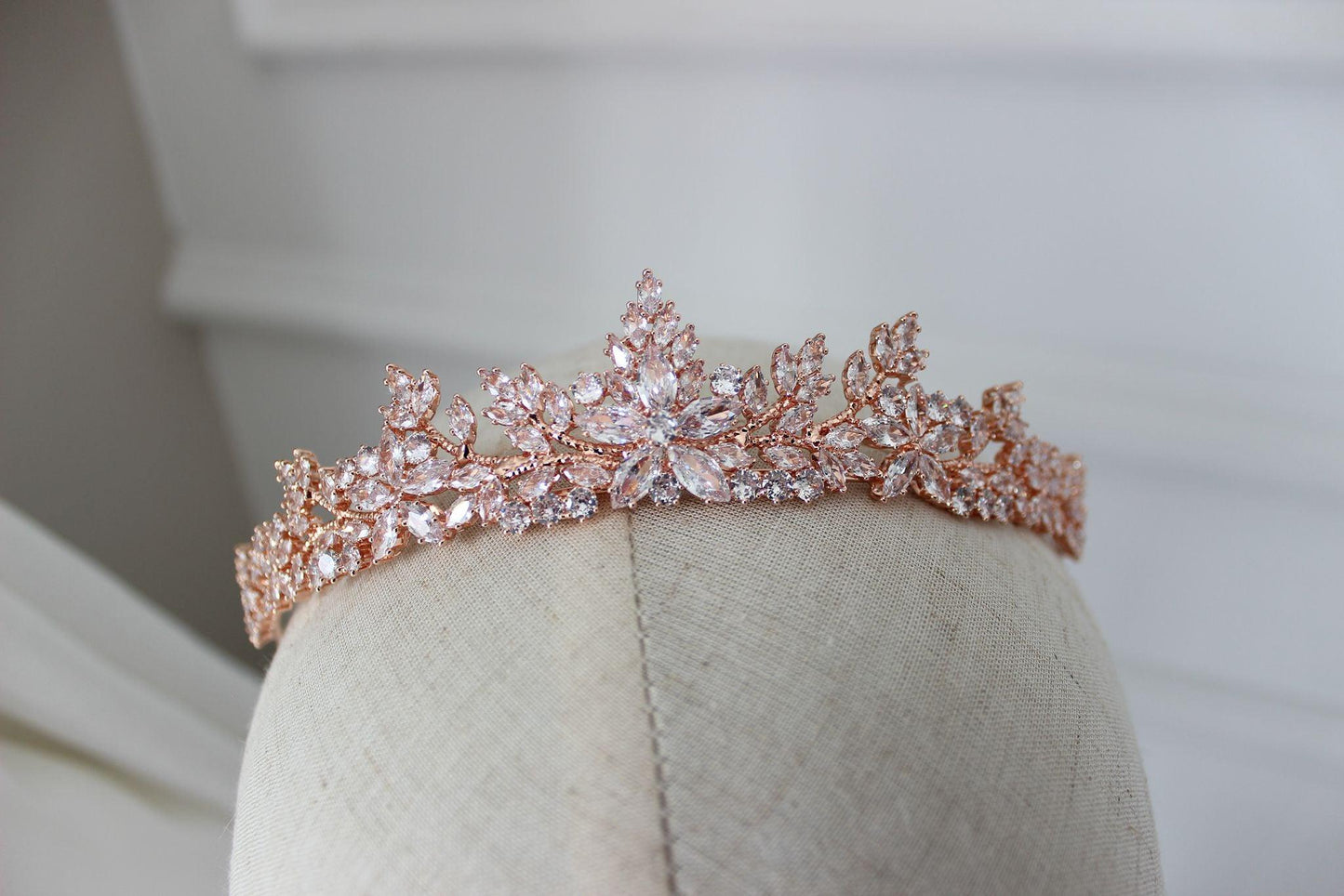 dana rose gold bridal tiara displayed on mannequin