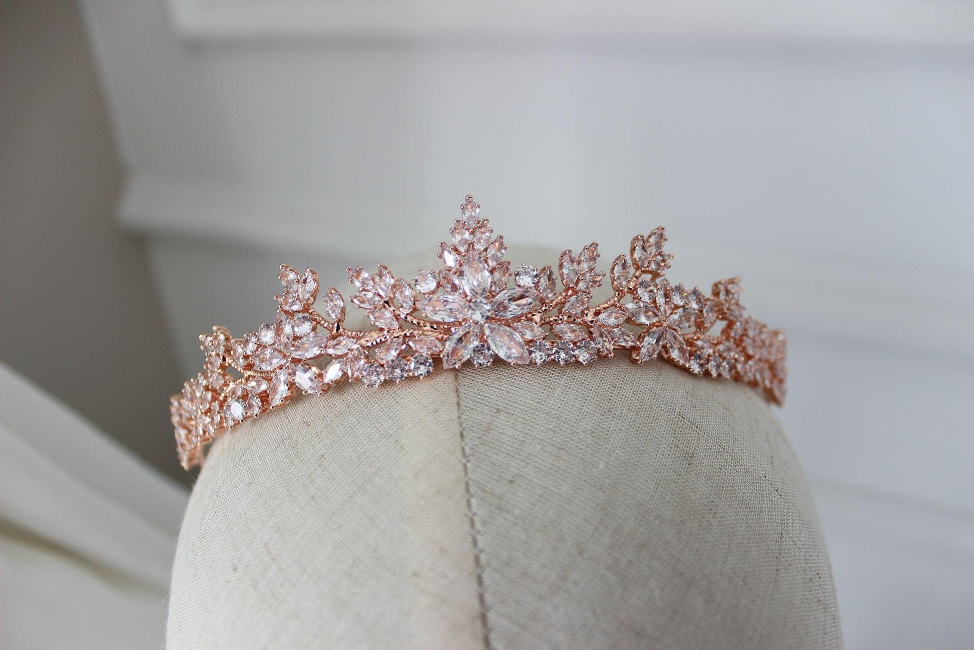dana rose gold bridal tiara displayed on mannequin
