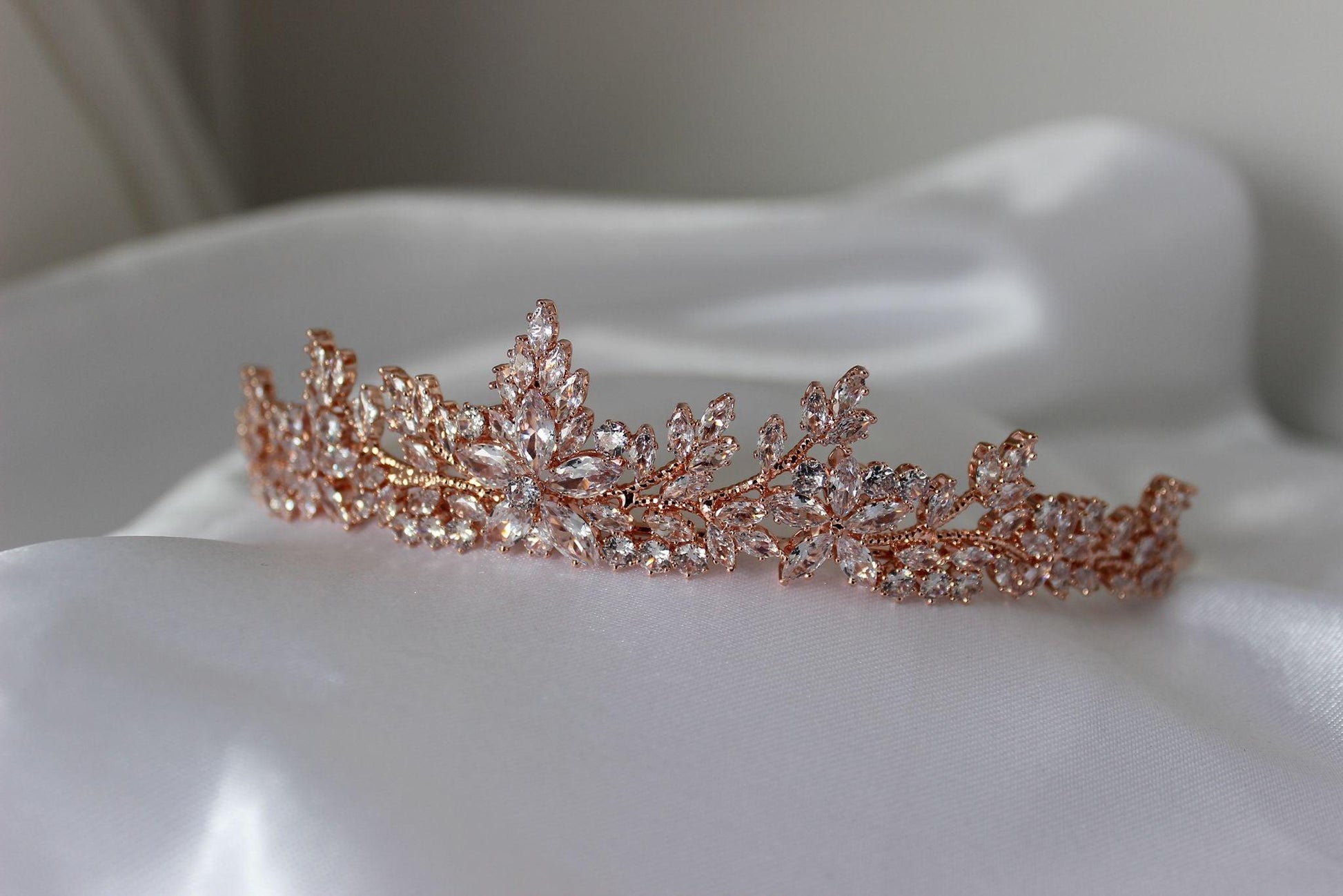 dana rose gold bridal tiara on white cloth
