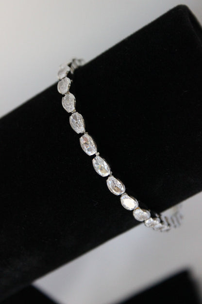 east-west-oval-tennis-bracelet-on-mannequin