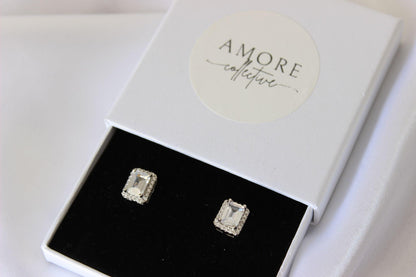 emerald cut silver stud earrings