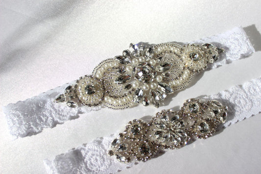Close up of Freya floral lace bridal garter with pearls and CZ crystal details