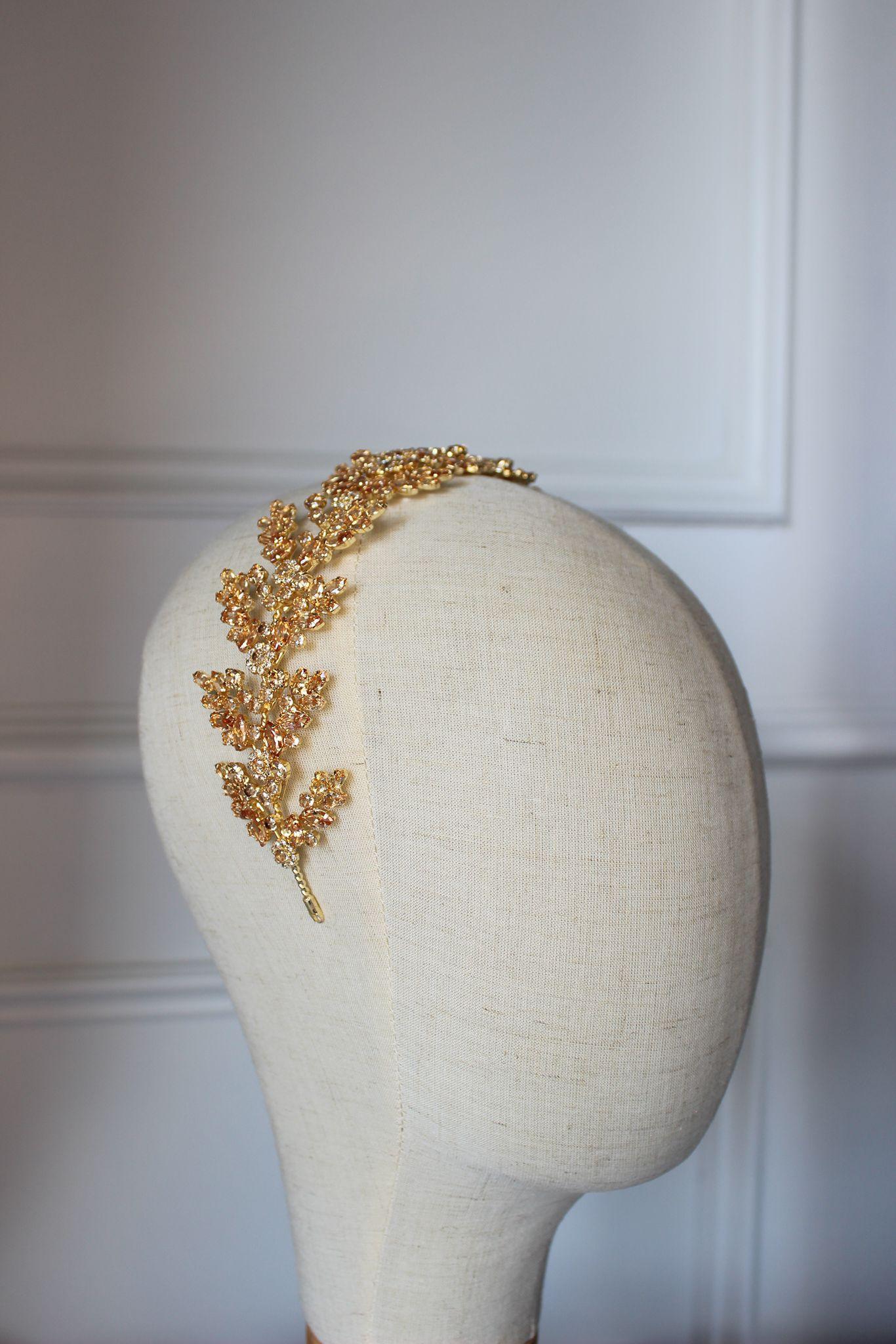 Gold flat bridal hair headpiece displayed on mannequin