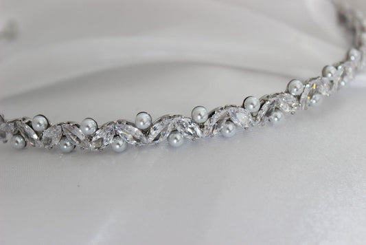 Jordyn crystal and pearl silver bridal headband on white cloth