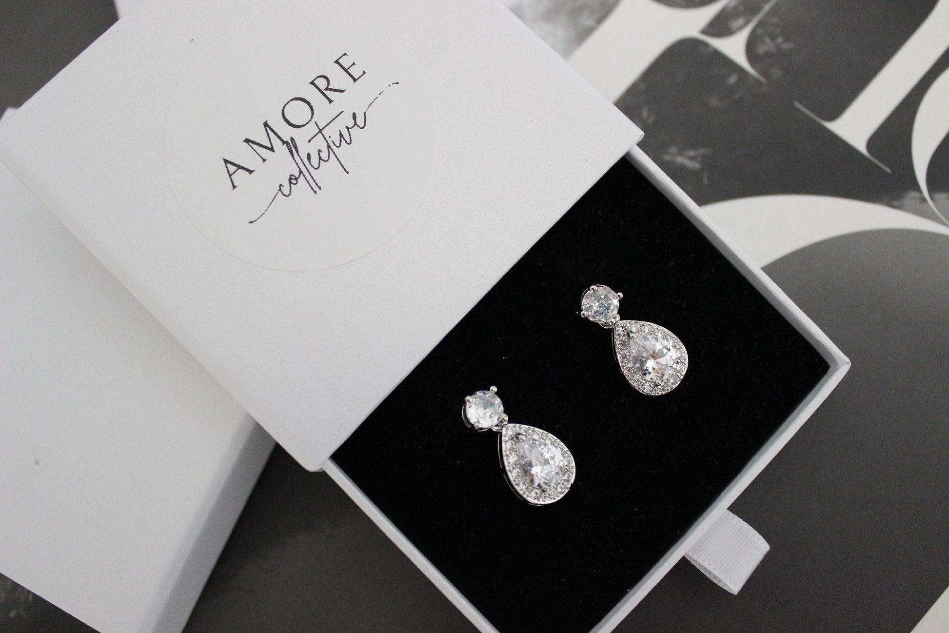 Karmela teardrop cubic zirconia silver drop earrings in jewellery box