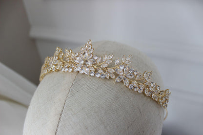 Close up of Swarovski crystal detailing on gold bridal tiara