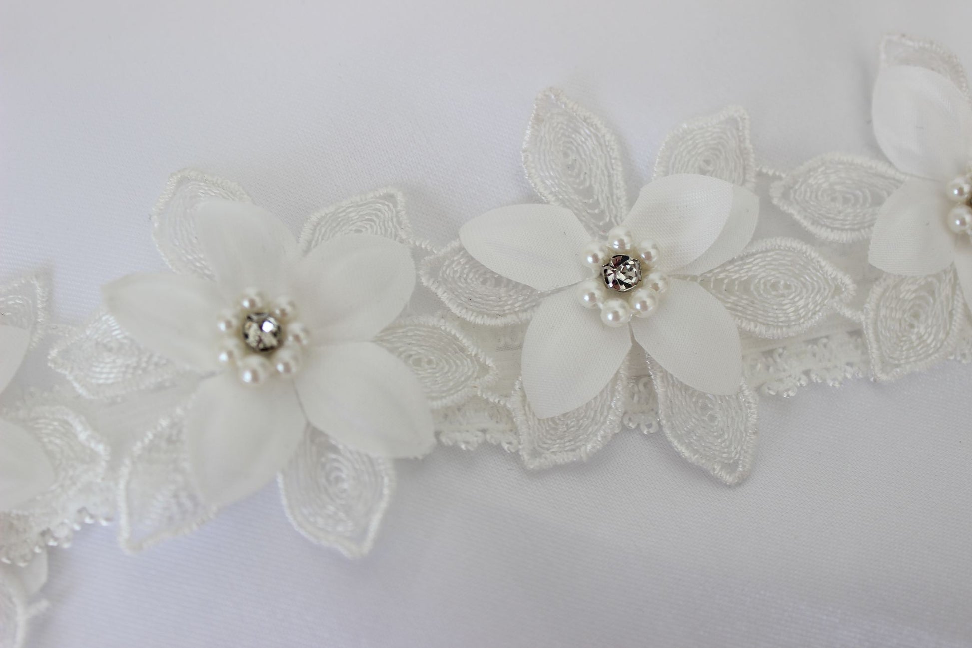 Pearl flower lace bridal garter with pearl and crystal floral embellishments