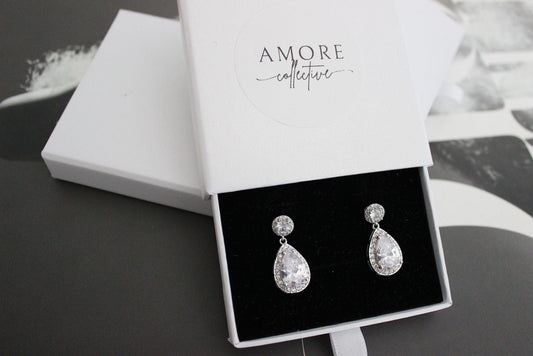 Silver round and pear drop earrings