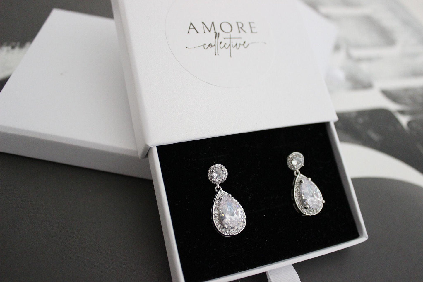 Round and Pear Drop Cubic Zirconia Silver Earrings